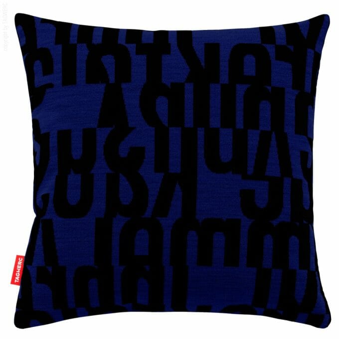 The cushion by TAGWERC with the letters pattern in black and cobalt by designer Gunnar Aagaard Andersen.