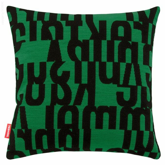 The cushion by TAGWERC with the letters pattern in black and emerald by designer Gunnar Aagaard Andersen.