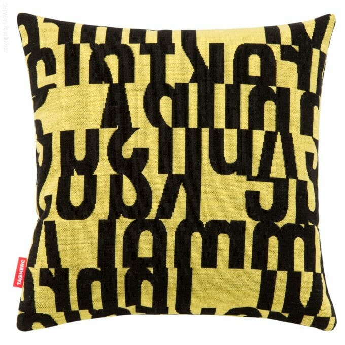 The cushion by TAGWERC with the letters pattern in black and yellow by designer Gunnar Aagaard Andersen.
